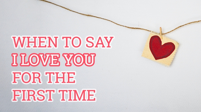 paper heart attached to a string next to the message "when to say I love you for the first time"