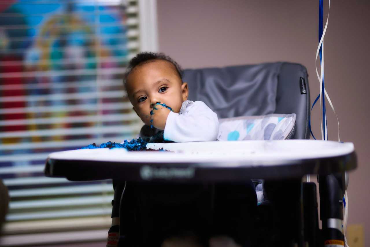 son in a kid's chair getting i love you son messages