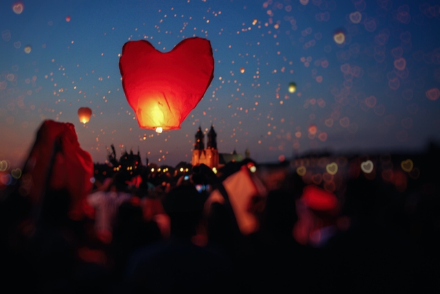 red balloons floating at night carrying good night friend messages