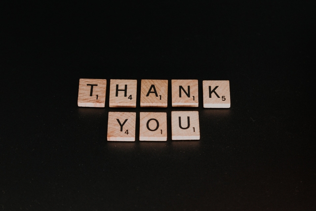 thank you written in word tiles by ai generator of thank you letters