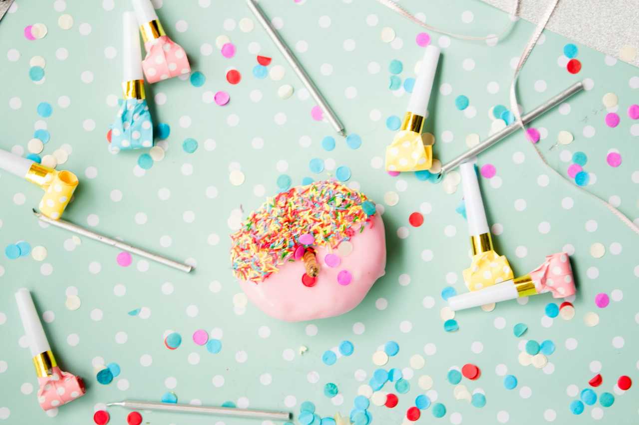 cake and birthday props for birthday invitation message
