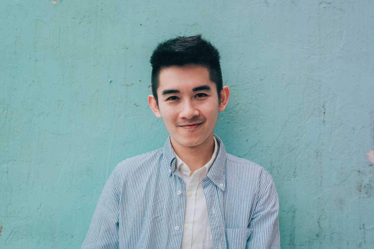 son smiling over a blue wall getting i love you son messages