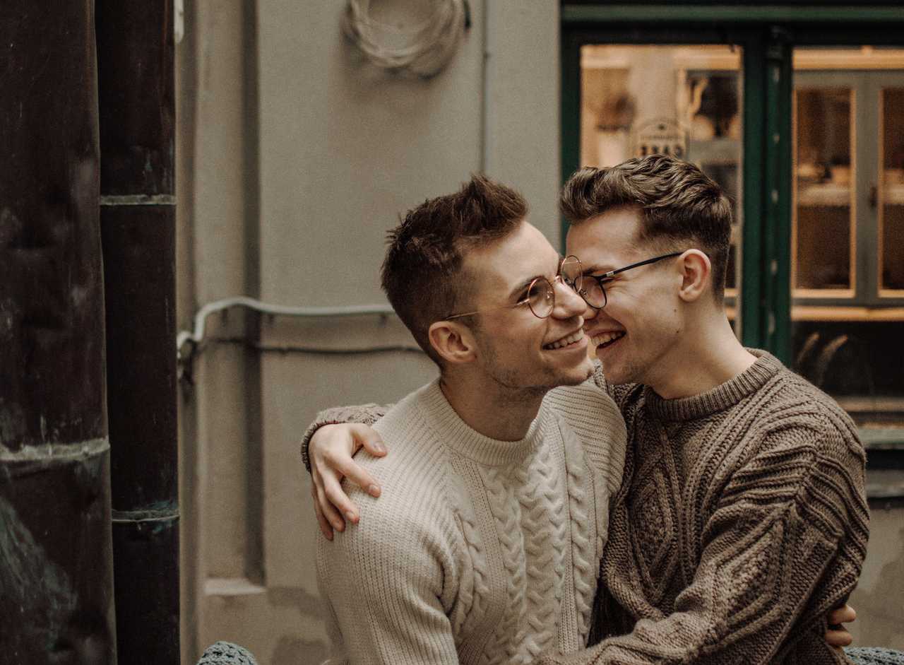 couple hugging and laughing about valentine's day quotes for him