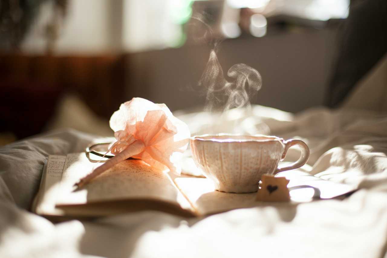 coffee book and flower over a bed with good morning messages for her and him