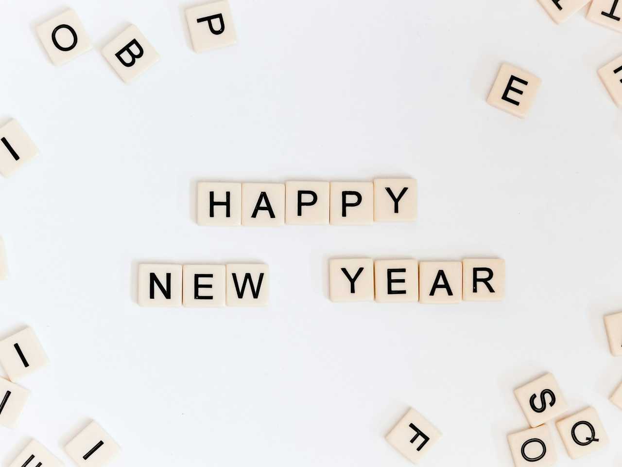 happy new year message in letter tiles