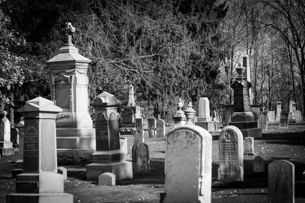 tombstones in a graveyard for halloween sayings