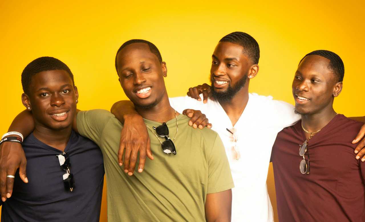 friends together saying short positive messages orange background