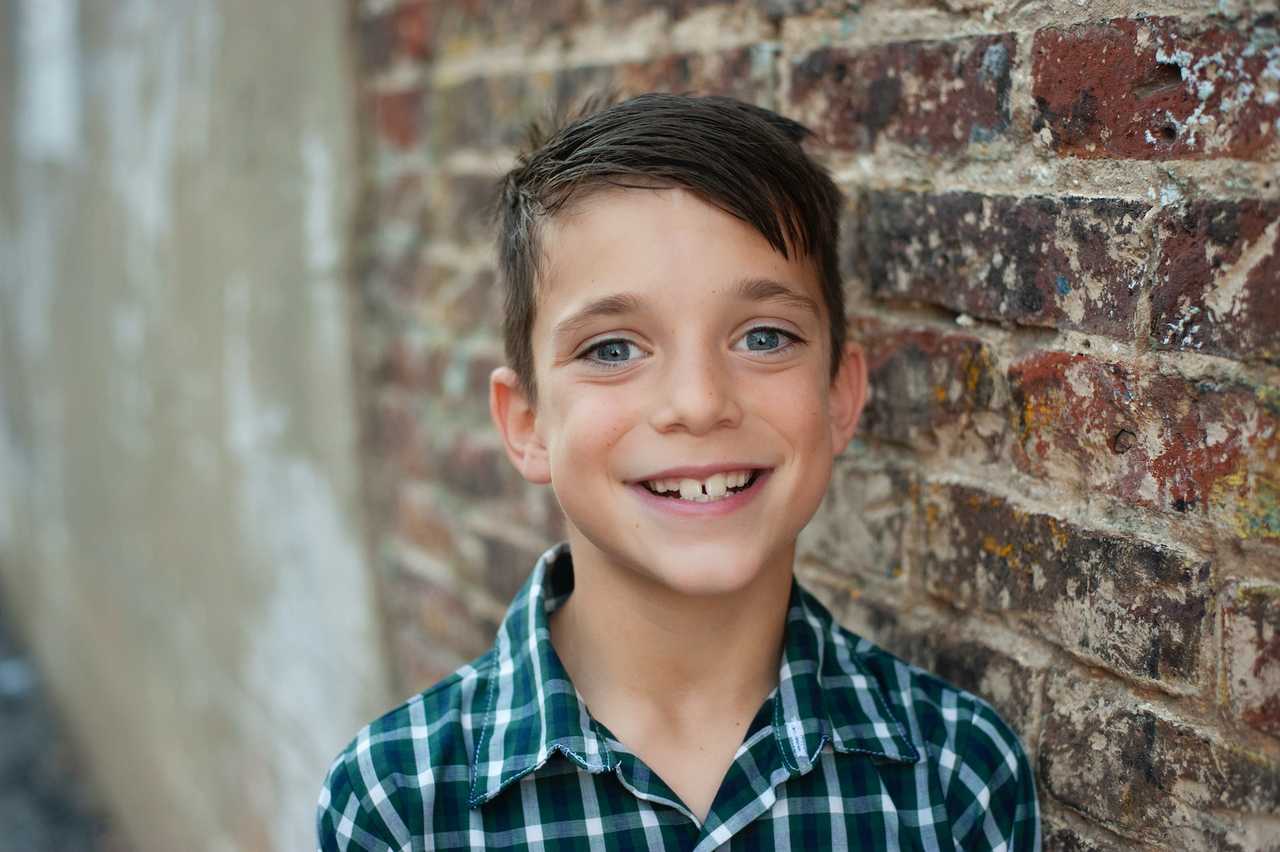 son smiling getting i love you messages from parents
