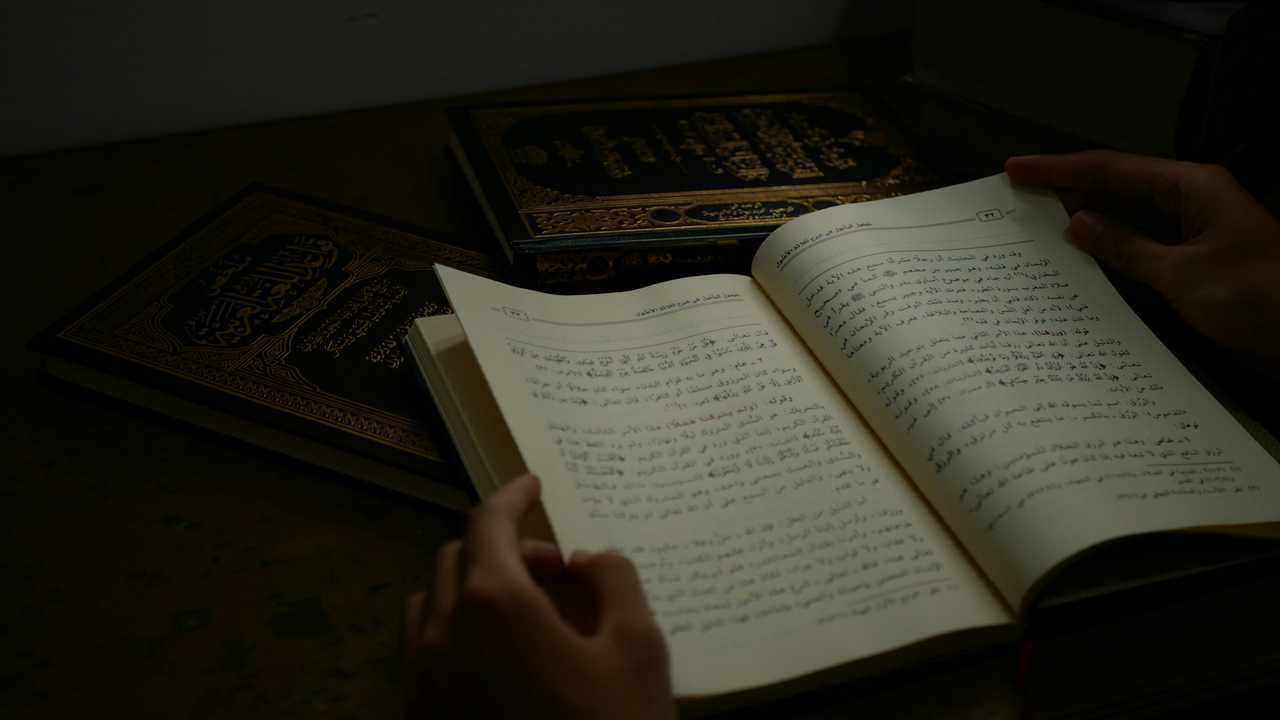 sacred book in a dark room with hand turning a page using ai prayer generator