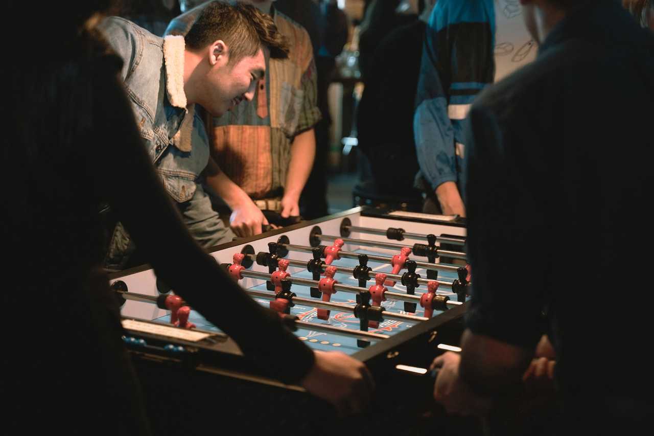 friends playing pool at night giving each other good night friend messages