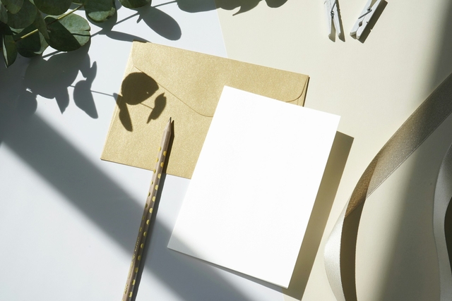 greeting card in blank with a envelope and a pencil to end